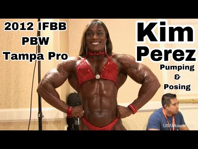 Kim Perez Pumping and Posing Backstage at 2012 IFBB PBW Tampa Pro