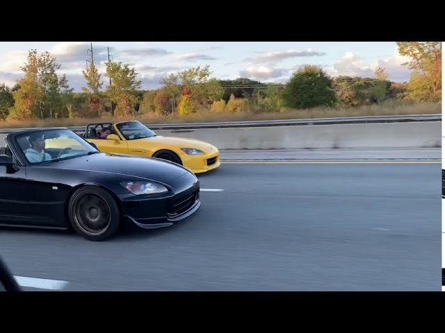 S2000 F22 (black car) vs S2000 K24 (yellow car)