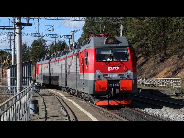 Trains in Siberia in golden autumn. Bolshoy Lug - Podkamennaya stretch. Russia. Irkutsk region.