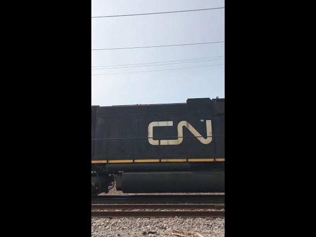 Slow CN coal train backs into train yard