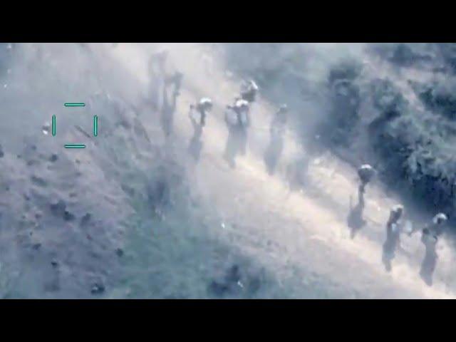 Azerbaijani Bayraktar TB2 chasing and launching bombs on Armenian soldiers