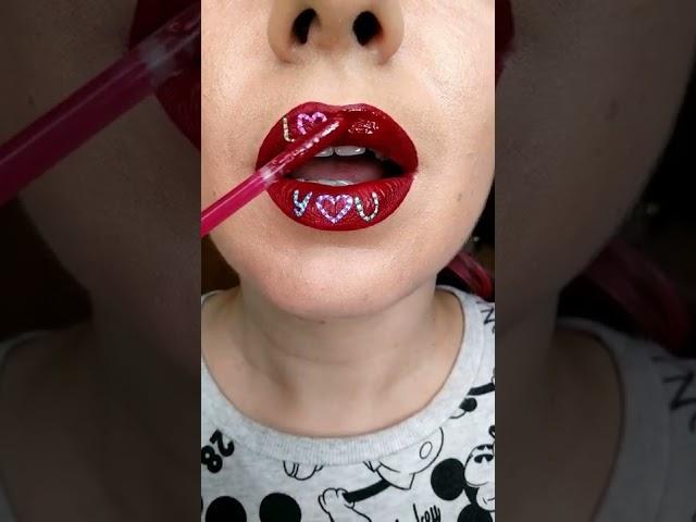 Magical red lipstick painting a lip art?