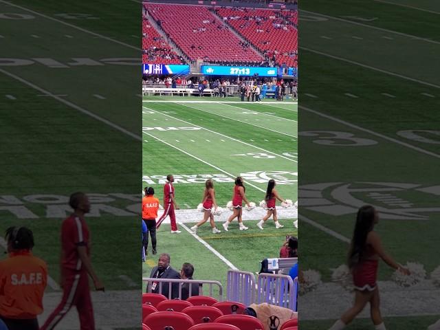 South Carolina State cheerleaders walk into the stadium pre-game at the Celebration Bowl