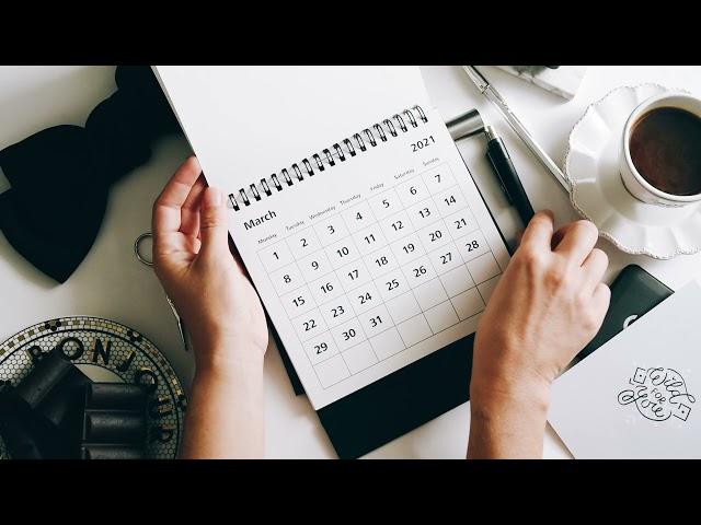 A person writing on calendar (free footage)