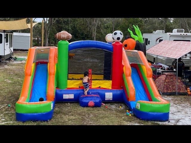 Unboxing and setting up our bounce house with double slides