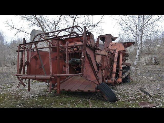 east of Chernobyl and the Pripyat river: Krasnoje (Красне) village & radioactive combine harvesters