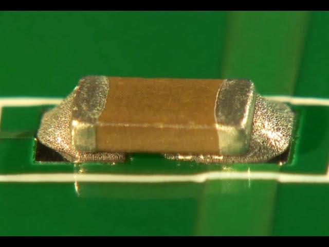 Solder balls forming under chip capacitor due to excessive paste - Surface Mount Process