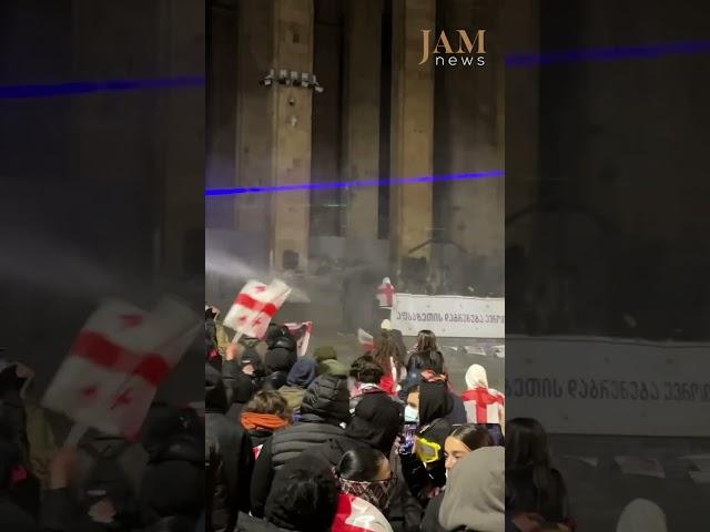 Protesters gathered near parliament are doused with water/ Tbilisi, Georgia/JAMnews English