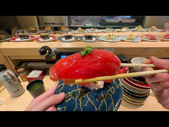 Eating at a Conveyor Belt Sushi Restaurant in Osaka