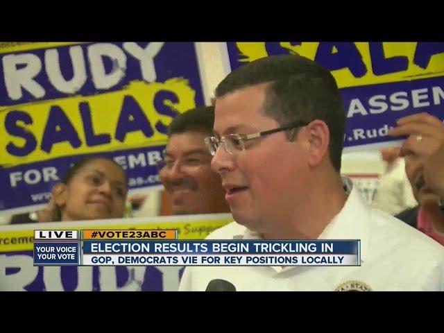 Jessica Harrington interviews Rudy Salas at Democratic watch party in Bakersfield