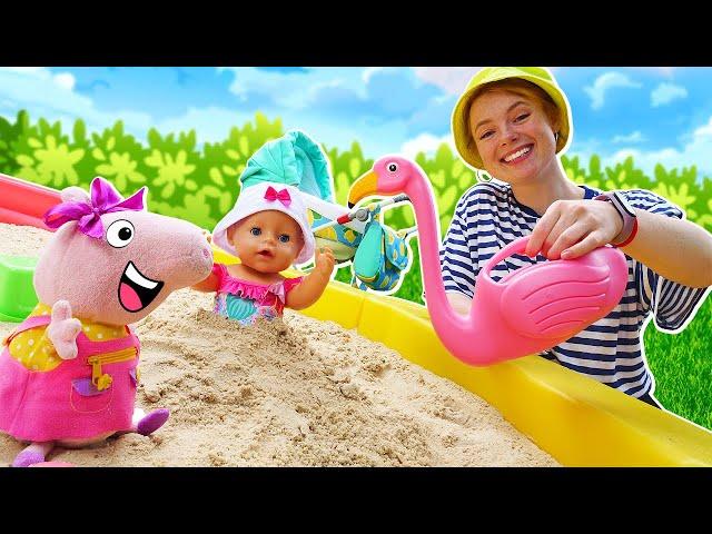 Spielzeug Video mit Peppa Wutz und Baby Born Puppen. Peppa und Baby Born spielen im Sandkasten