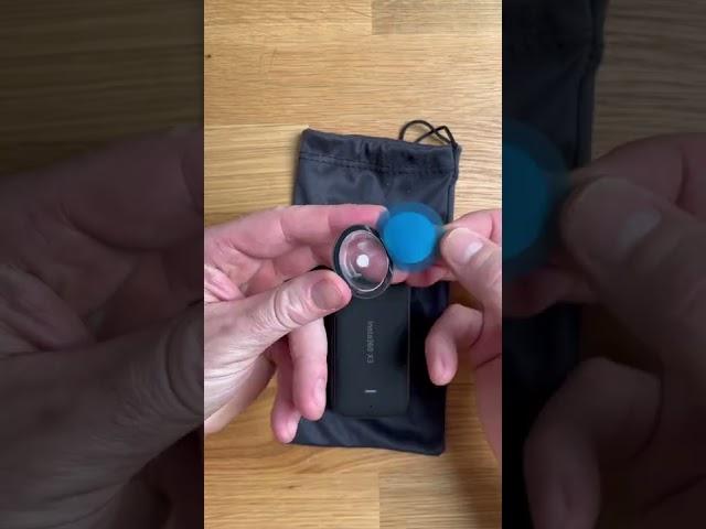 Installing sticky lens guards on my Insta360 X3