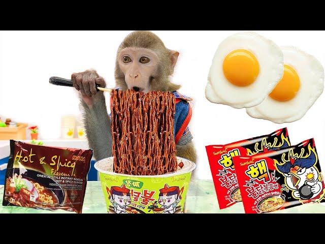 Baby monkey Bim Bim eats noodles and eggs and plays with puppies