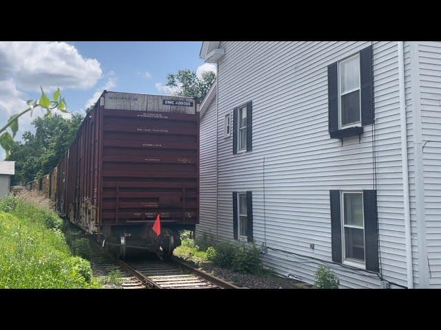 Freight train feet from houses! Mass Central Railroad