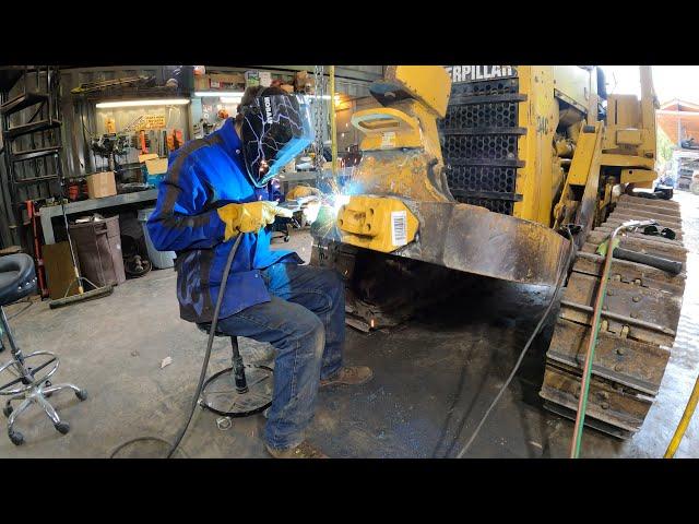 Replacing the mounts on a bulldozer blade