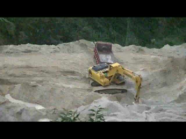 Komatsu Excavator Digging Feldspar