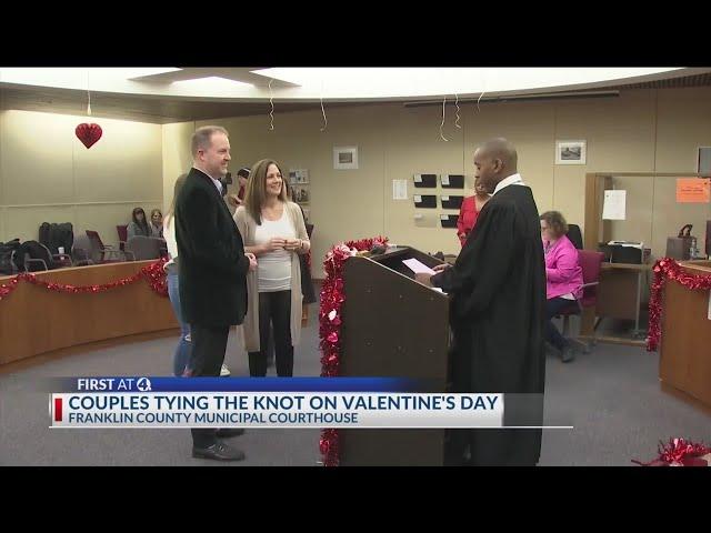 Dozens of couples celebrate Valentine's Day with courthouse weddings