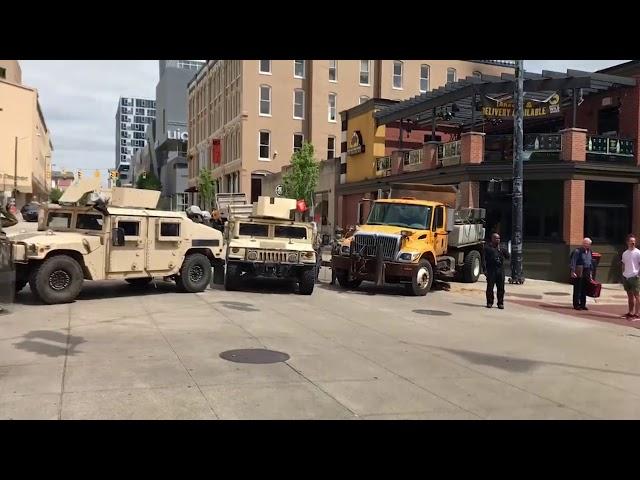 Michigan National Guard Humvees line street in downtown Grand Rapids