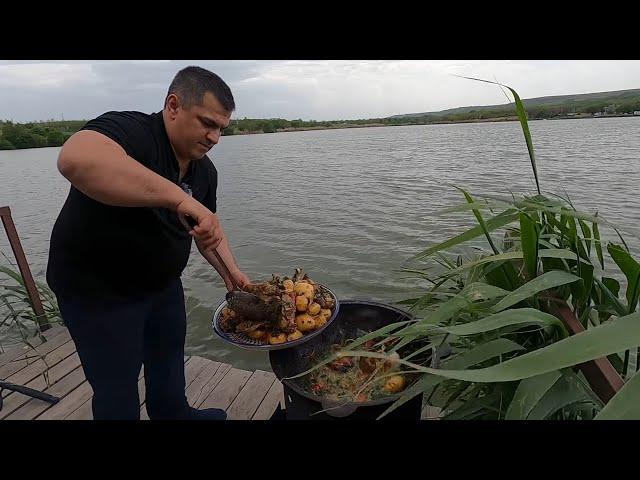 Duck rustic recipe with potatoes in a cauldron. duck cauldron