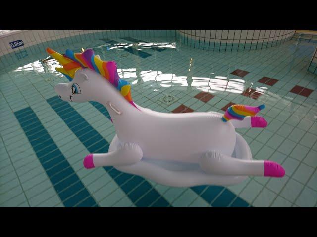 Inflatable ride on unicorn toy