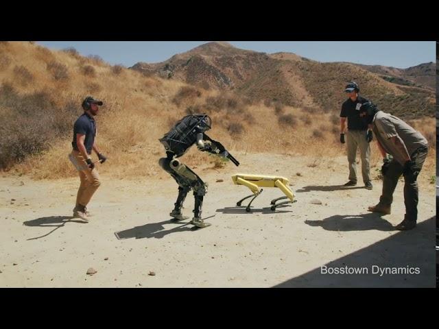 Humans bully a robot to kill a robotic dog