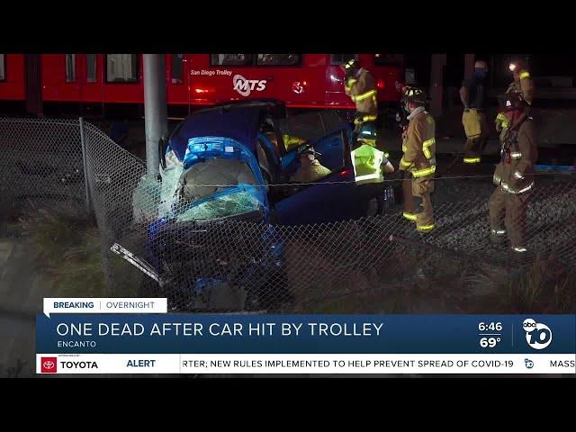 Car struck by trolley, driver killed