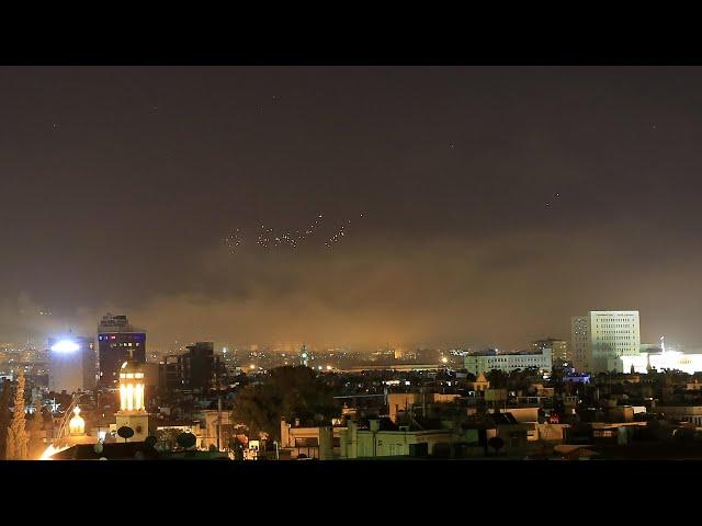 Amateur footage shows missiles falling over Damascus as airstrikes begin