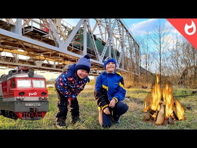 Freight trains and picnic / railway bridge and river flood