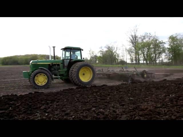 John Deere 4555 with 24ft dual wing Disk Spring 09 HD