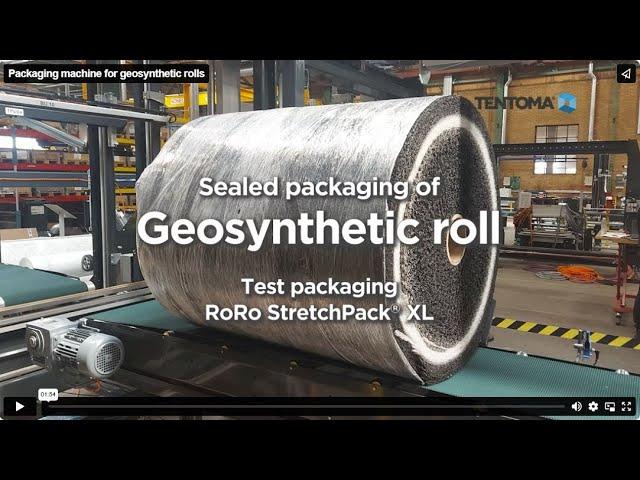 Packaging machine wrapping geosynthetic rolls