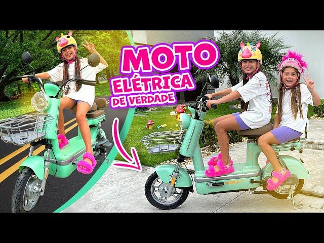 24 horas COMPRANDO uma MOTO ELETRICA de verdade para a Laurinha