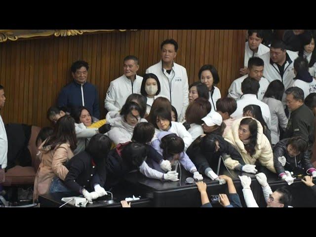 Taiwan lawmakers brawl over bills that could 'damage democracy' | AFP