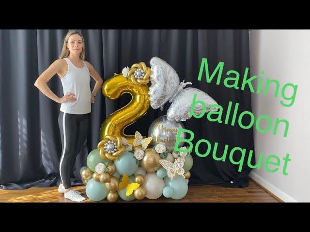 Creating a balloon bouquet!