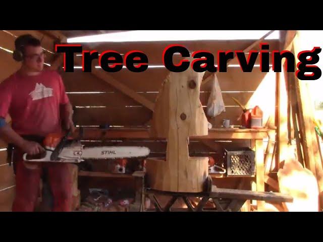 Chainsaw carving welcome trees