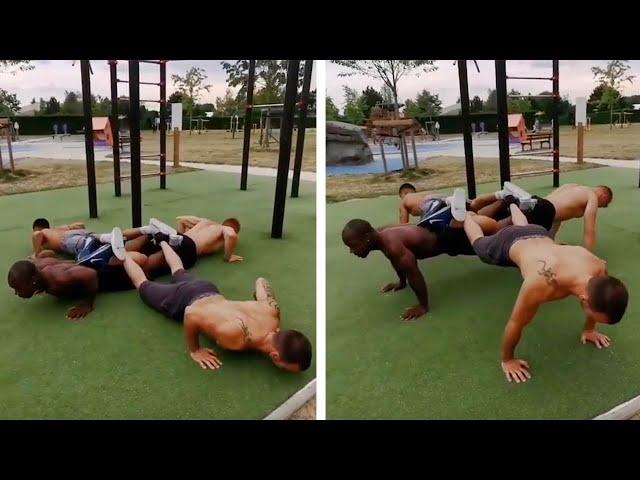 Group Of Friends Perform Group Push-Ups