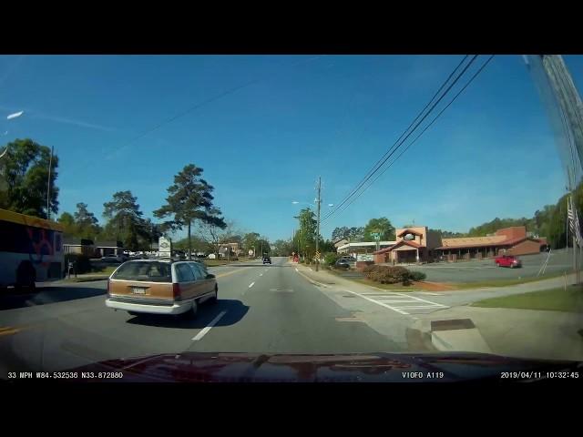 Octogenarian almost takes out 2 cars