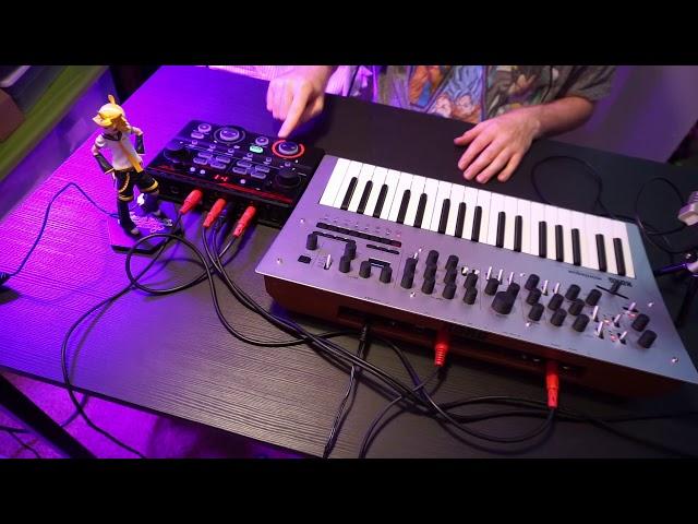 Using a midi syncable (boos rc-202) loop station with a synth or sequencer.