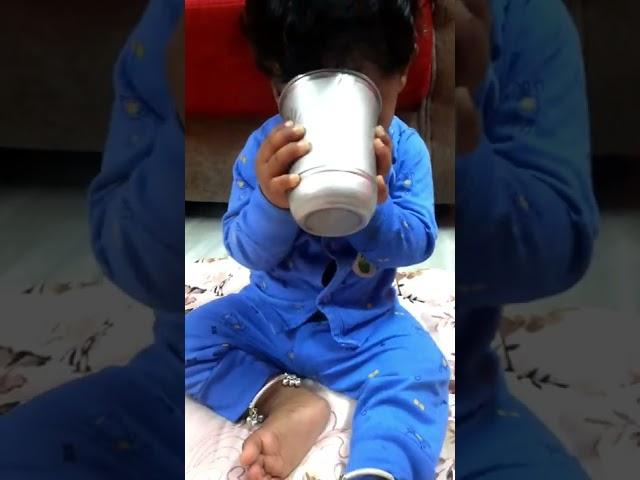 Baby drinking milk in glass #funny #shorts #funnyvideo #cutebaby #babyeating #short