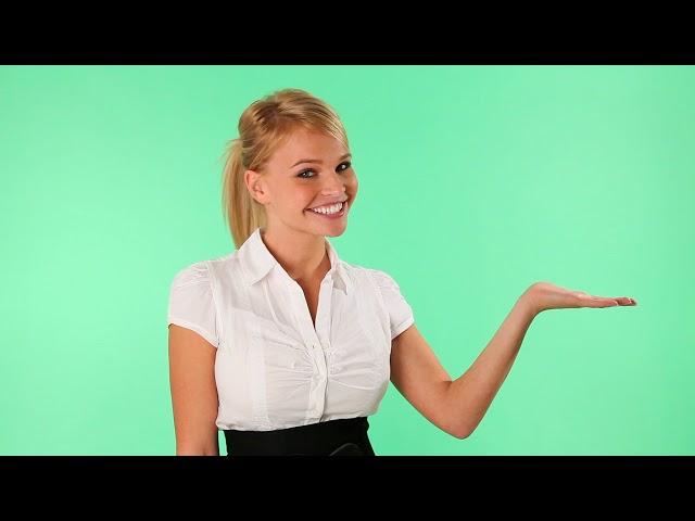 Beautiful woman presenting product with green screen - Chroma Key - No Copyright