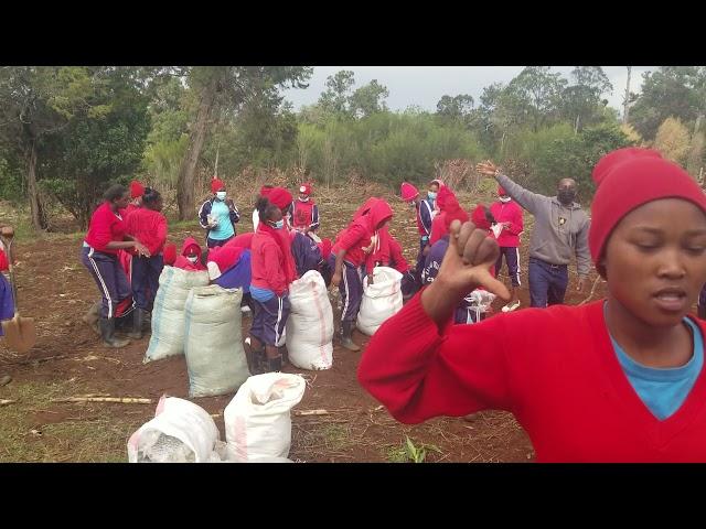 WE CARE FOR THE ENVIRONMENT OUR MOTHER EARTH STOP GLOBAL WARMING KALALU GIRLS SECONDARY LIKIPIA EAST