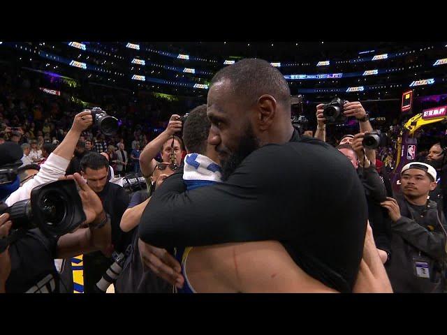 LeBron James & Steph Curry embrace after the Warriors' Game 6 elimination 