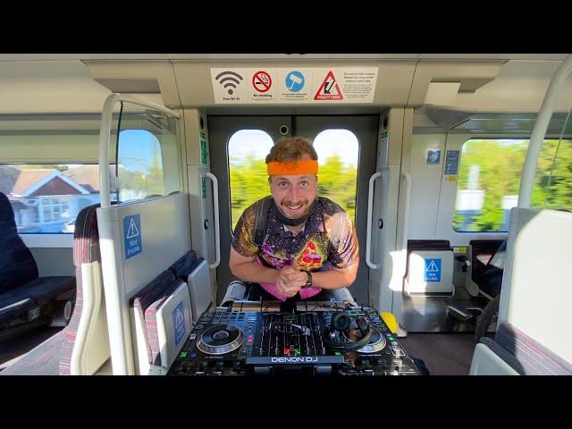 Walking DJ takes TRAIN to THEME park..