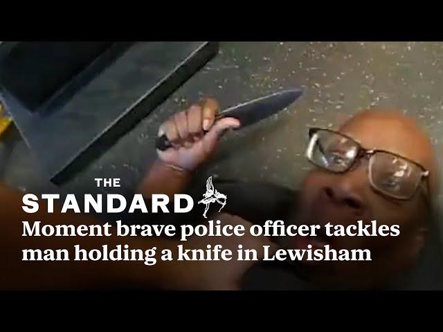 Moment brave police officer tackles man holding a knife in Lewisham