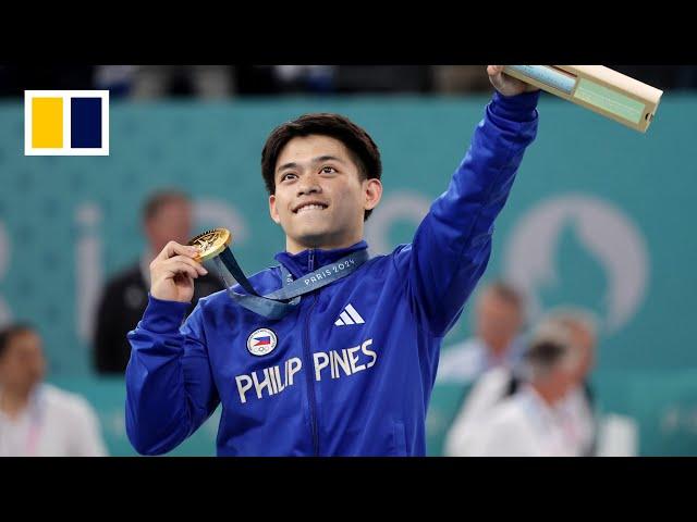 Philippine Olympic gold gymnast Carlos Yulo showered with gifts