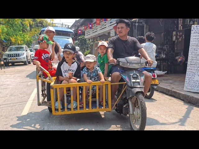 Jumbo ride by the Mekong river in Laos