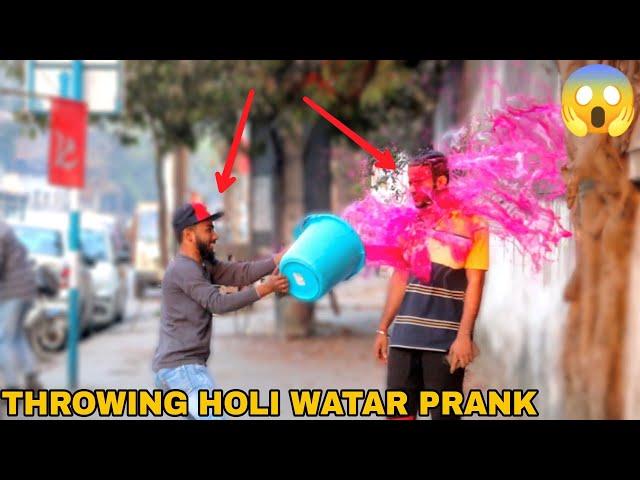 Throwing Holi Water Colour at People Prank ! || MOUZ PRANK