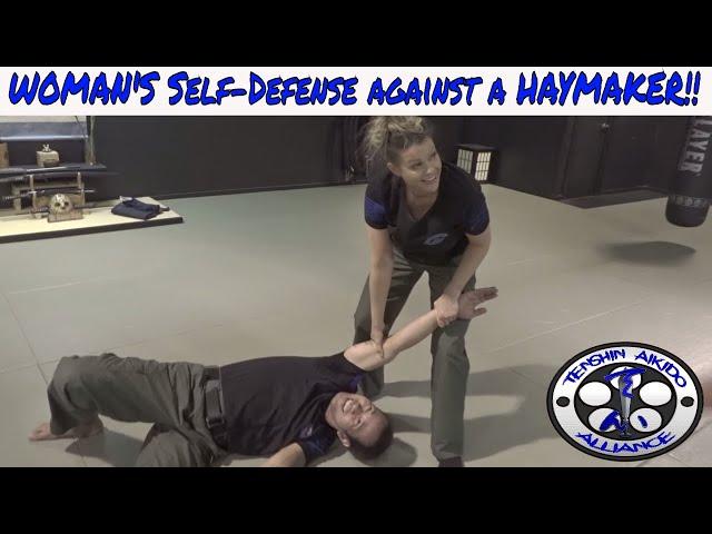 WOMAN'S Self - Defense against a haymaker | Combative Concepts