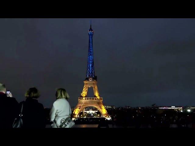 Eiffel Tower lights up in colors of Ukraine flag