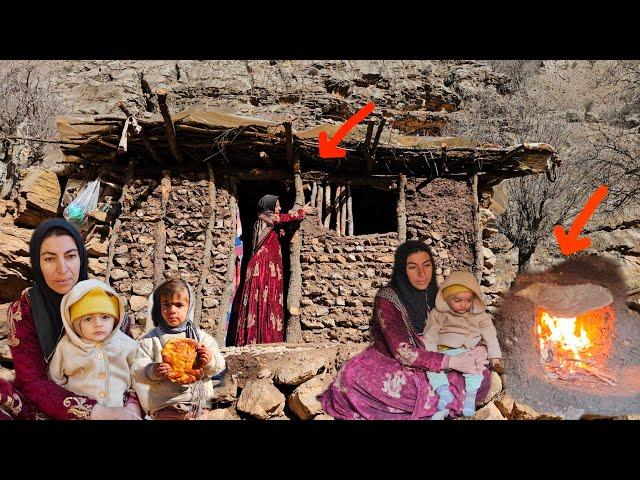 Khadija builds a stone fireplace and the cameraman helps bring in the chimney and food.