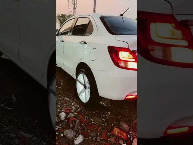 Modified Swift Dzire in White Colour 